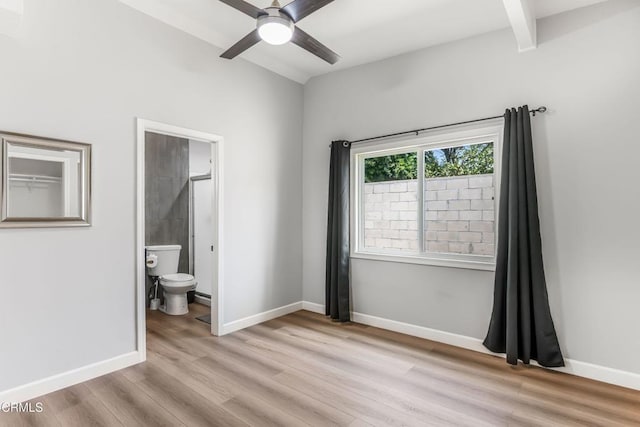 7745 Geyser Ave, Reseda, CA 91335 - unfurnished bedroom featuring light wood-style flooring, ensuite bathroom, baseboards, and ceiling fan