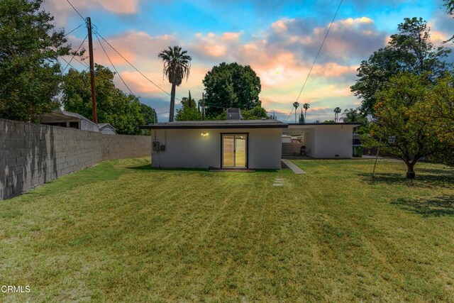 7745 Geyser Ave, Reseda, CA 91335 - back of property at dusk with stucco siding