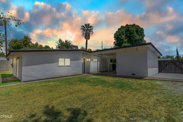 7745 Geyser Ave, Reseda, CA 91335 - rear view of house featuring stucco siding and a patio area