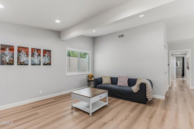7745 Geyser Ave, Reseda, CA 91335 - living room featuring recessed lighting, light wood-style floors, baseboards, and beam ceiling