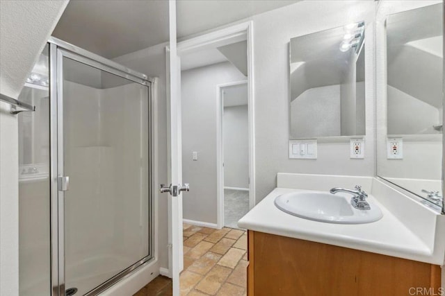3023 Pacific Palm Way, San Diego, CA 92117 - full bathroom featuring a stall shower, vanity, and stone tile floors