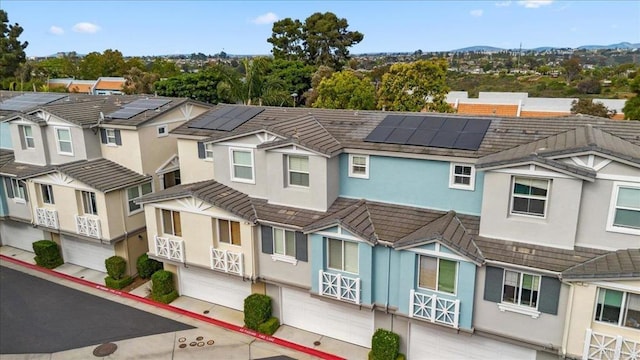 3023 Pacific Palm Way, San Diego, CA 92117 - view of property with an attached garage, a residential view, and a mountain view