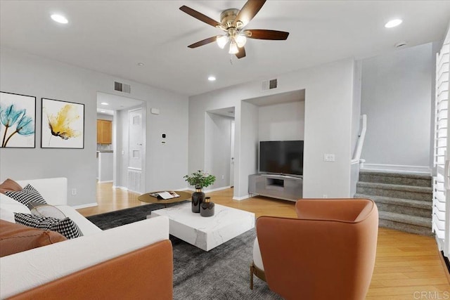 3023 Pacific Palm Way, San Diego, CA 92117 - living room with light wood-style flooring, ceiling fan, stairs, recessed lighting, and baseboards