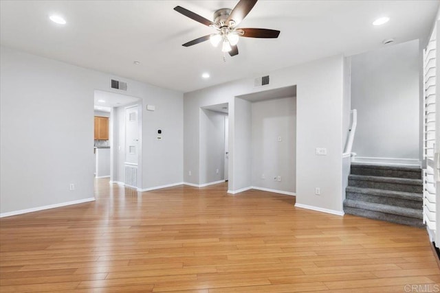 3023 Pacific Palm Way, San Diego, CA 92117 - unfurnished living room featuring a ceiling fan, stairway, light wood-style flooring, baseboards, and recessed lighting