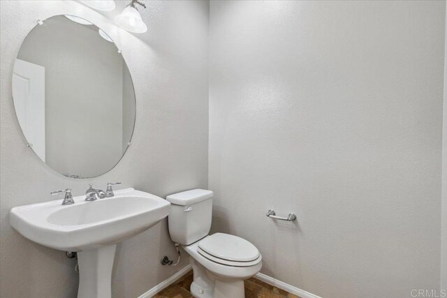 3023 Pacific Palm Way, San Diego, CA 92117 - bathroom with baseboards and toilet