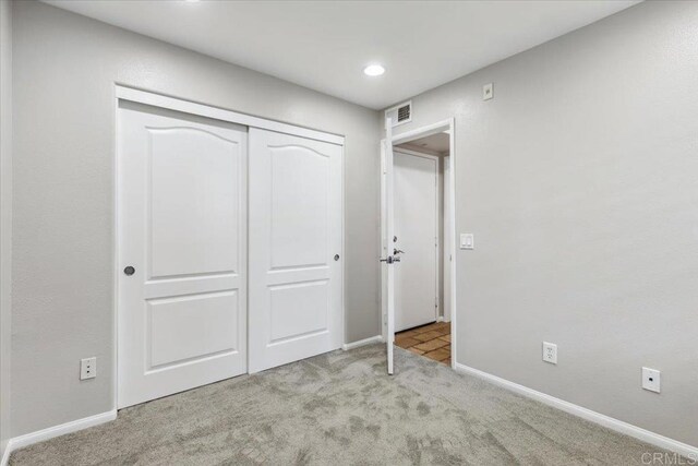 3023 Pacific Palm Way, San Diego, CA 92117 - unfurnished bedroom featuring carpet flooring, a closet, and recessed lighting
