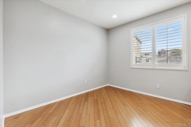 3023 Pacific Palm Way, San Diego, CA 92117 - spare room featuring baseboards and light wood-style flooring