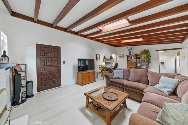 2324 Manchester Ave, Cardiff By The Sea, CA 92007 - living area with beamed ceiling and wood finished floors