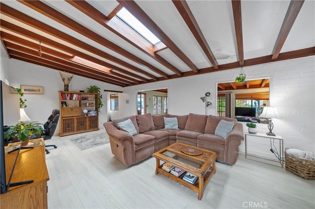 2324 Manchester Ave, Cardiff By The Sea, CA 92007 - living room featuring wood finished floors and a skylight