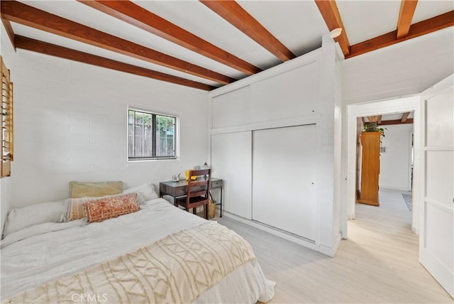 2324 Manchester Ave, Cardiff By The Sea, CA 92007 - bedroom featuring beam ceiling, a closet, and light wood-type flooring
