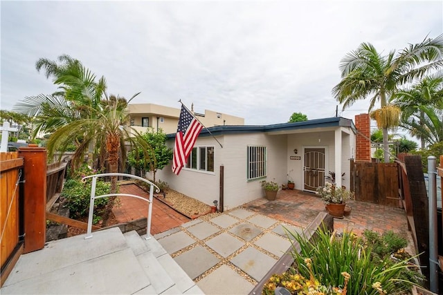 2324 Manchester Ave, Cardiff By The Sea, CA 92007 - view of front of property with a patio area, a gate, and stucco siding