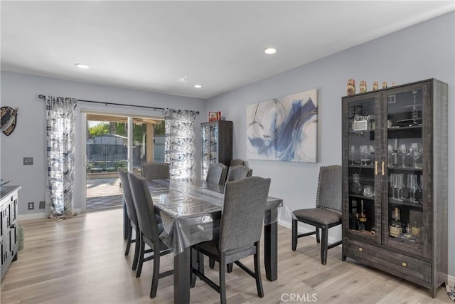 17426 Flanders St, Granada Hills, CA 91344 - dining space featuring light wood finished floors, recessed lighting, and baseboards