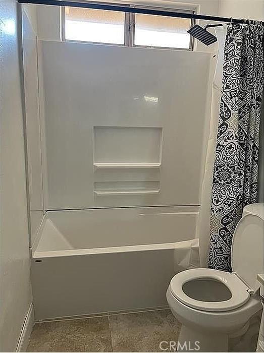 37713 57th St E, Palmdale, CA 93552 - bathroom with shower / bathtub combination with curtain and toilet