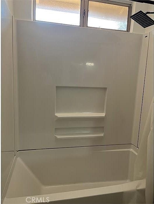 37713 57th St E, Palmdale, CA 93552 - bathroom view of fridge and a shower