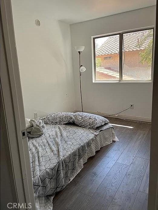 37713 57th St E, Palmdale, CA 93552 - bedroom with hardwood / wood-style floors