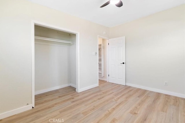 12074 Lee Ave, Adelanto, CA 92301 - unfurnished bedroom with wood finished floors, baseboards, and a closet