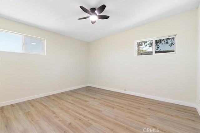 12074 Lee Ave, Adelanto, CA 92301 - spare room featuring baseboards, light wood finished floors, and ceiling fan