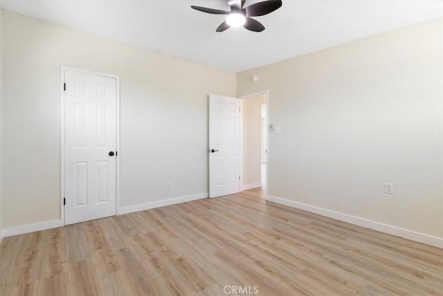 12074 Lee Ave, Adelanto, CA 92301 - unfurnished room with ceiling fan, light wood finished floors, and baseboards