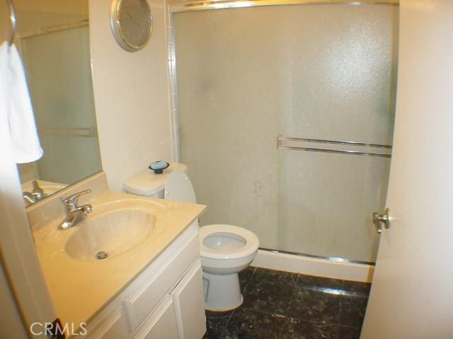 1412 Colonial Way, San Jacinto, CA 92583 - full bath with toilet, vanity, a shower stall, and tile patterned flooring