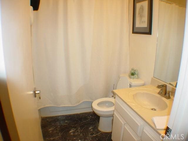 1412 Colonial Way, San Jacinto, CA 92583 - bathroom featuring vanity, toilet, marble look tile flooring, and shower / bath combination with curtain