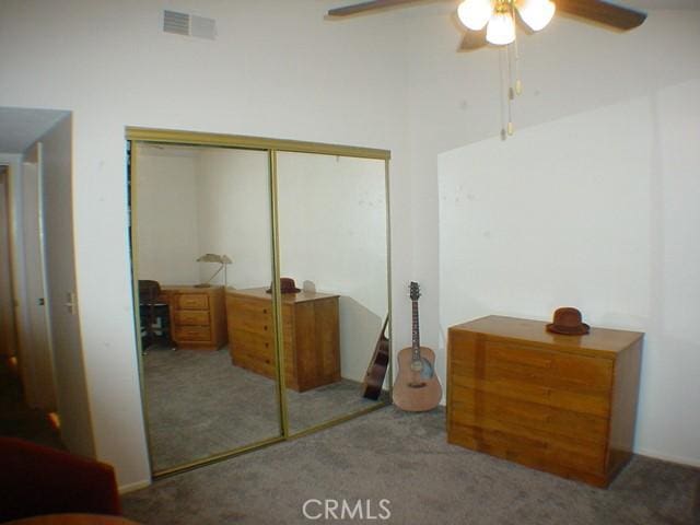 1412 Colonial Way, San Jacinto, CA 92583 - carpeted bedroom with a closet and a ceiling fan