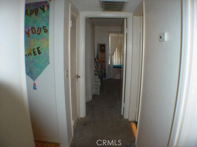 1412 Colonial Way, San Jacinto, CA 92583 - corridor with carpet flooring