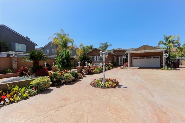 40203 Grenache Ct, Murrieta, CA 92563 - view of front facade with concrete driveway, a garage, and stucco siding