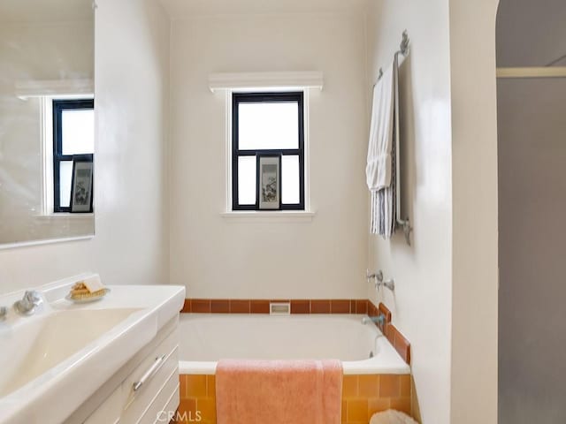 639 Magnolia Ave, Inglewood, CA 90301 - bathroom featuring plenty of natural light, a bathtub, vanity, and a shower