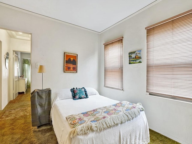639 Magnolia Ave, Inglewood, CA 90301 - bedroom featuring carpet floors, multiple windows, and ornamental molding
