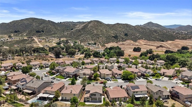 34090 Lady Fern Ct, Lake Elsinore, CA 92532 - aerial view of property and surrounding area with a mountainous background and nearby suburban area