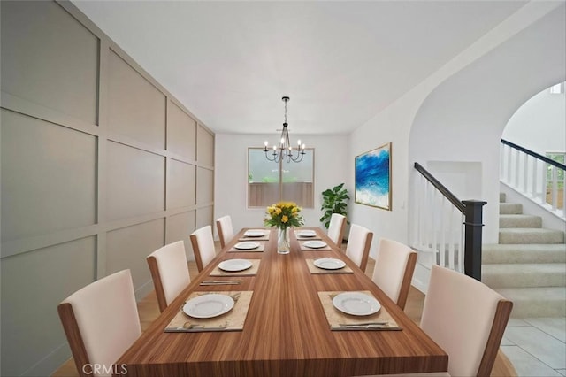 34090 Lady Fern Ct, Lake Elsinore, CA 92532 - dining room with stairway, a chandelier, and healthy amount of natural light