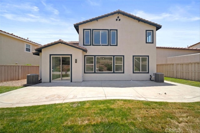 34090 Lady Fern Ct, Lake Elsinore, CA 92532 - rear view of house with a tile roof, stucco siding, central AC unit, and a patio