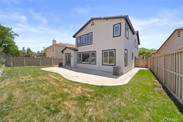 34090 Lady Fern Ct, Lake Elsinore, CA 92532 - rear view of property with a tile roof, a patio area, stucco siding, and central AC