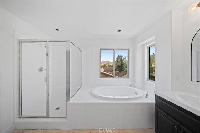 34090 Lady Fern Ct, Lake Elsinore, CA 92532 - bathroom with vanity, a garden tub, and a shower stall