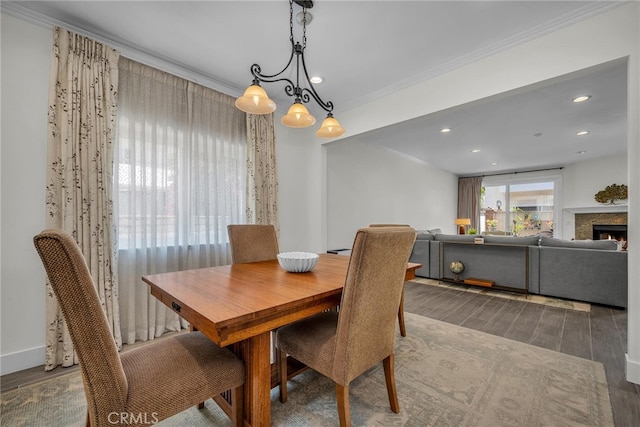 1205 S Catalina Ave S Unit A, Redondo Beach, CA 90277 - dining room with crown molding, wood finished floors, recessed lighting, a chandelier, and a warm lit fireplace