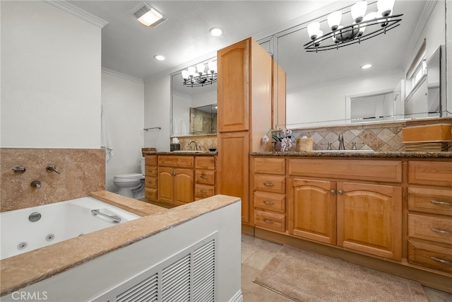 1205 S Catalina Ave S Unit A, Redondo Beach, CA 90277 - bathroom featuring a chandelier, crown molding, backsplash, vanity, and a jetted tub