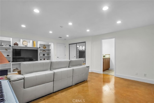 1205 S Catalina Ave S Unit A, Redondo Beach, CA 90277 - living area featuring finished concrete flooring, baseboards, and recessed lighting