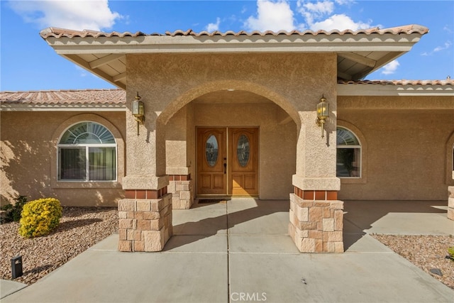 13209 Richmond Way, Apple Valley, CA 92308 - property entrance with stucco siding and a tiled roof