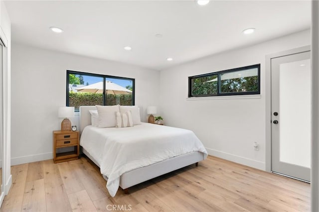 742 Hudson Ave, Costa Mesa, CA 92626 - bedroom featuring multiple windows, light wood-type flooring, baseboards, and recessed lighting