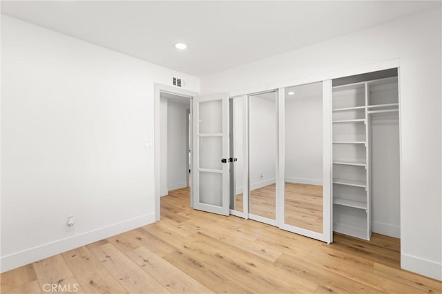 742 Hudson Ave, Costa Mesa, CA 92626 - unfurnished bedroom featuring baseboards, light wood-type flooring, and recessed lighting