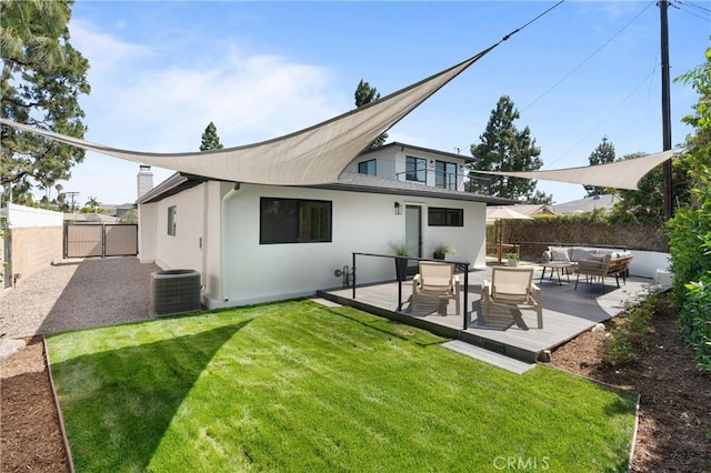 742 Hudson Ave, Costa Mesa, CA 92626 - rear view of house with central air condition unit, an outdoor living space, a wooden deck, a gate, and stucco siding