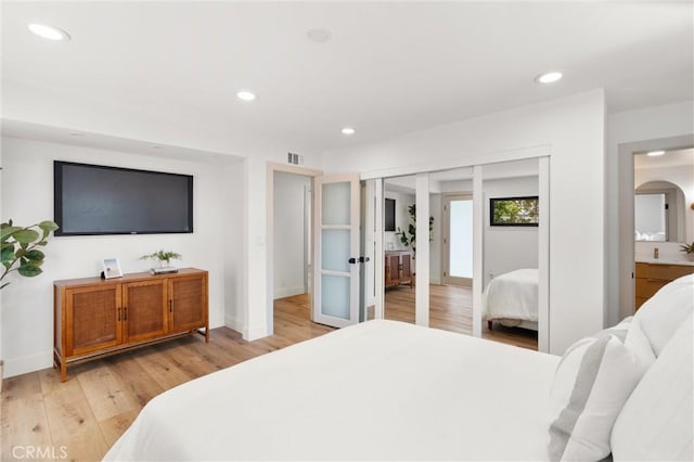 742 Hudson Ave, Costa Mesa, CA 92626 - bedroom featuring light wood-style flooring, recessed lighting, baseboards, french doors, and ensuite bathroom