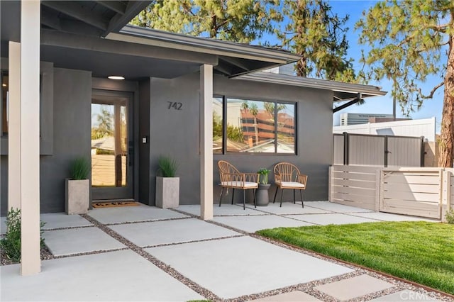 742 Hudson Ave, Costa Mesa, CA 92626 - property entrance with stucco siding and a patio