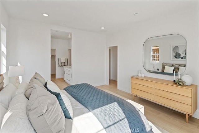 415 E 220th St, Carson, CA 90745 - bedroom featuring light wood-style floors and recessed lighting