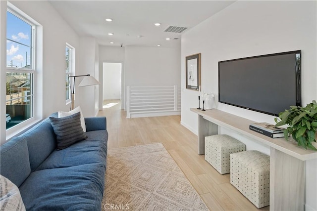 415 E 220th St, Carson, CA 90745 - living area featuring light wood-style flooring and recessed lighting