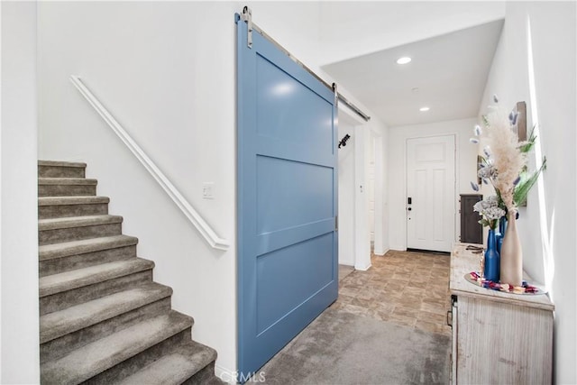 32172 Verbena Way, Temecula, CA 92591 - stairway with a barn door, recessed lighting, and stone finish floors