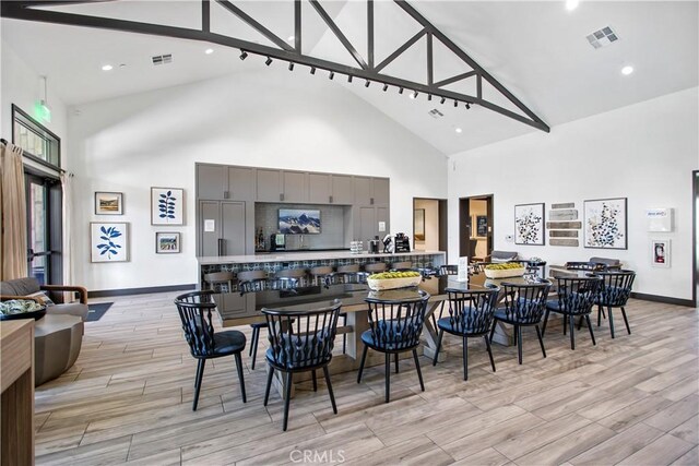 32172 Verbena Way, Temecula, CA 92591 - dining room featuring high vaulted ceiling, light wood-style floors, baseboards, and recessed lighting