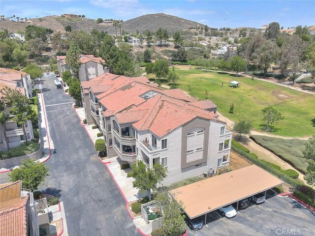 1995 Las Colinas Cir Unit 307, Corona, CA 92879 - aerial perspective of suburban area featuring a mountain backdrop