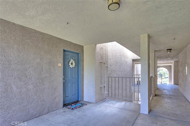 1995 Las Colinas Cir Unit 307, Corona, CA 92879 - doorway to property featuring stucco siding