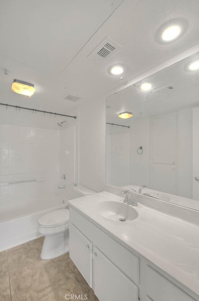 1995 Las Colinas Cir Unit 307, Corona, CA 92879 - bathroom featuring vanity, toilet, shower / tub combination, and tile patterned floors